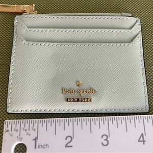 Kate Spade slim card holder with zipper enclosure